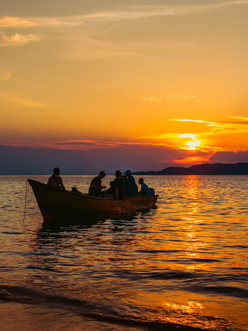 Placeholder — a wooden boat on the Banggai sea at sunset